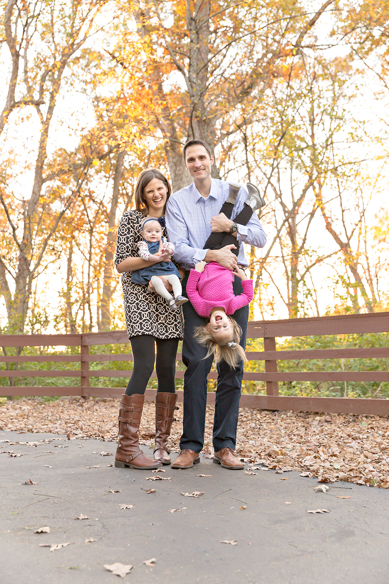 family of four playing on fall day | St. Louis Family Photographer