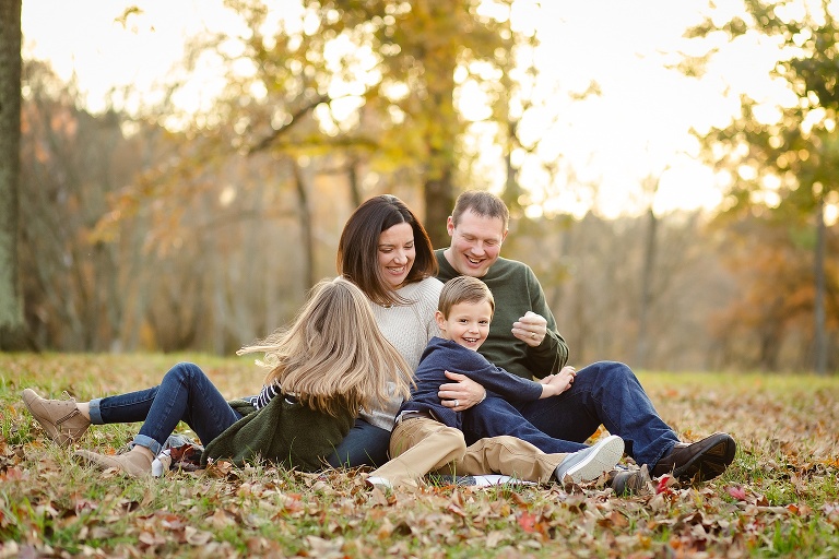 Sweet family sitting on blanket in park having fun | KGriggs Photography