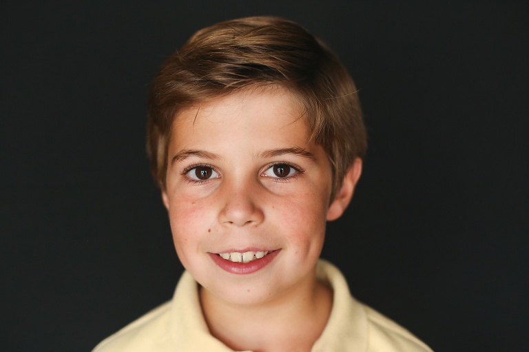 School photo of young boy with big brown eyes | St. Louis School Photography