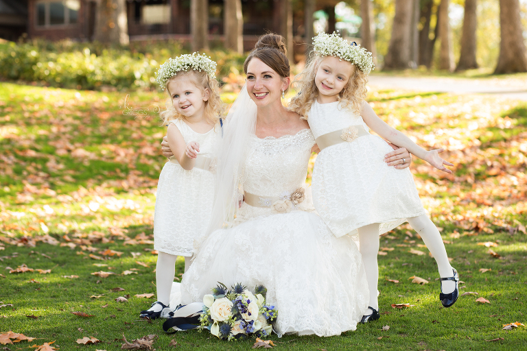 bride kneeling with her 2 flower girls | St. Louis Photographers
