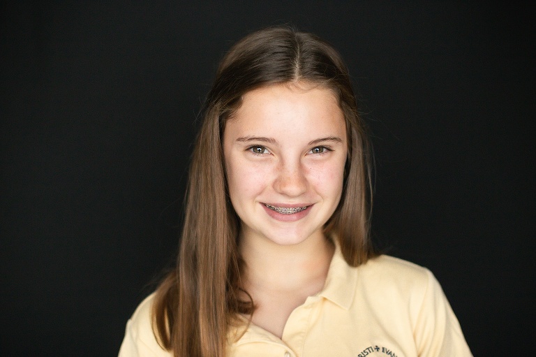 School photo of teen age girl with brown hair and braces | St. Louis School Photographer