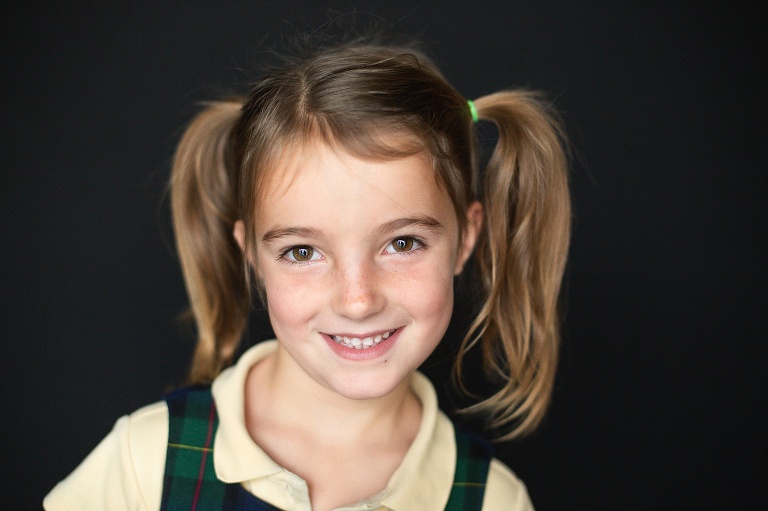 School photo of young girl with pigtails | St. Louis School Photography