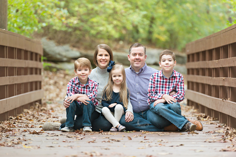 Family of 5 sitting on bridge | St. Louis Photography
