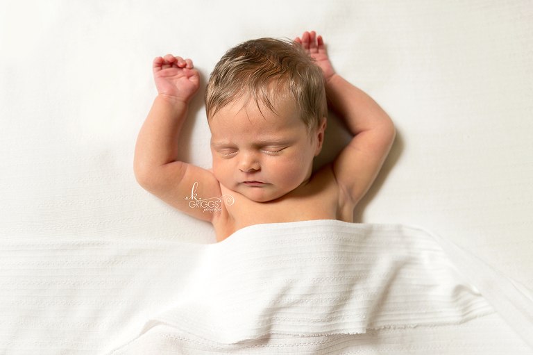 Newborn on a white blanket | St. Louis Newborn Photos