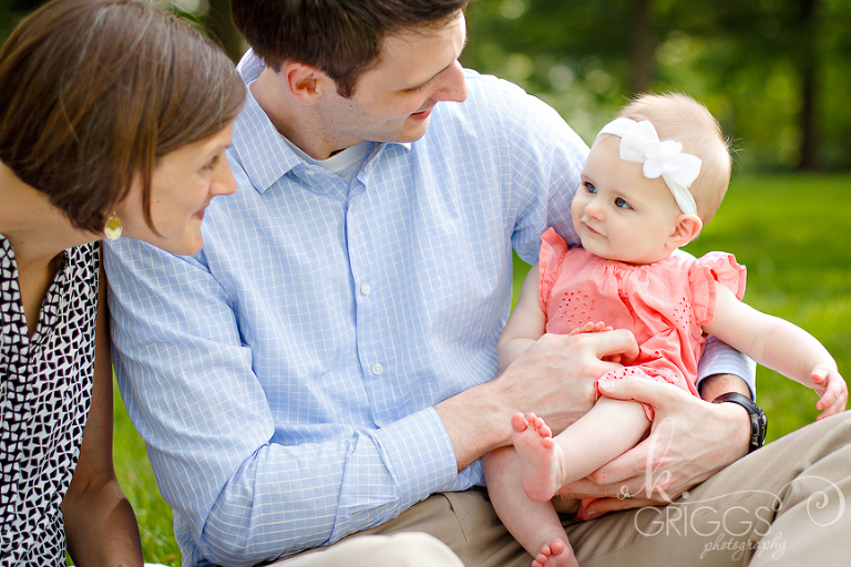 Baby girl with parents in park | St. Louis Family Portraits