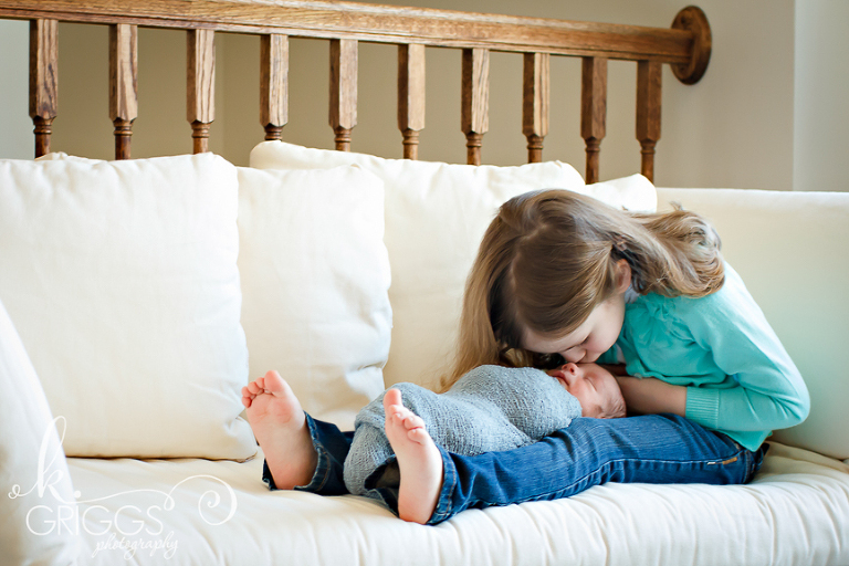 St. Louis Newborn Photographer - KGriggs Photography - big sister kissing newborn boy