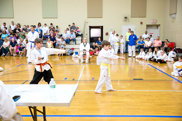 boy performing taekwondo form | kirkwood children's photographer