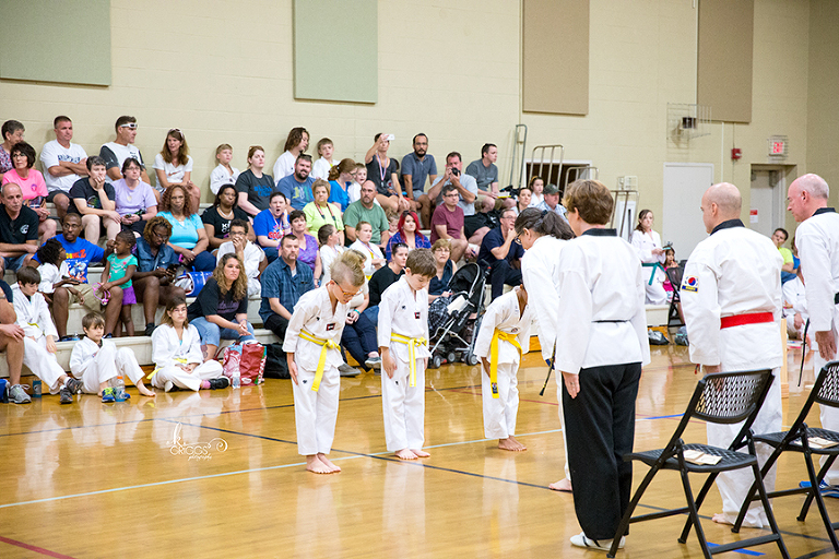 boys bowing to judges at tournament | st louis photography