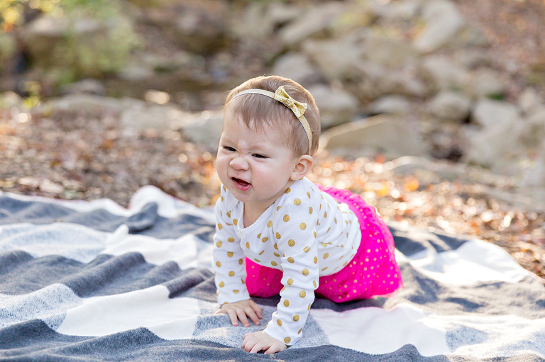Infant girl making funny face - Longview Farm Park | St. Louis Photography