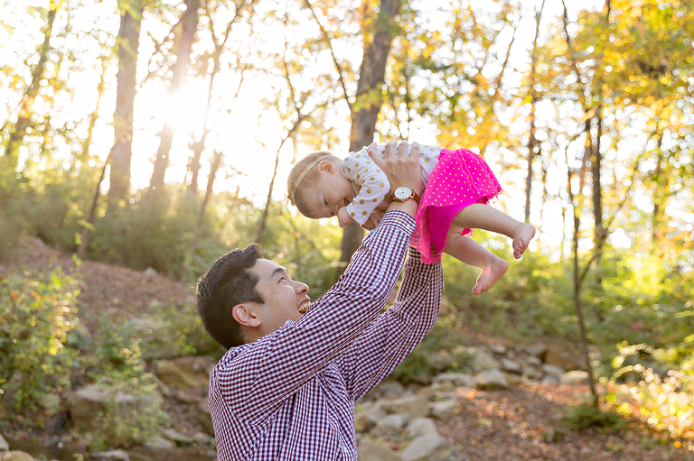Daddy holding daughter over his head - Longview Farm Park | St. Louis Family Photography