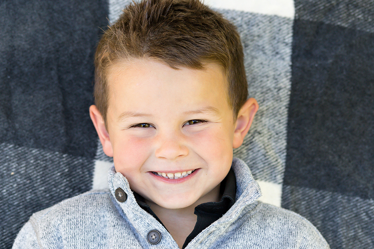 Sweet little boy laying on blanket {St. Louis Family Photography}