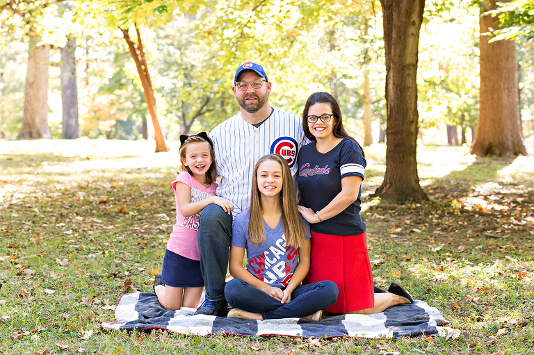 Family of four dressed in sports clothes {St. Louis Photography}