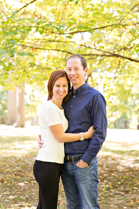Sweet couple hugging under tree in a park {St. Louis family photographer}