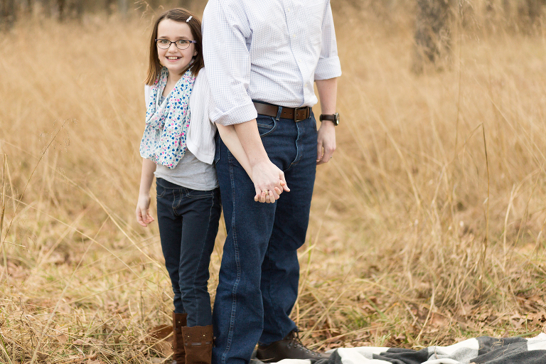 Young girl holding father's hand | Kirkwood Photography
