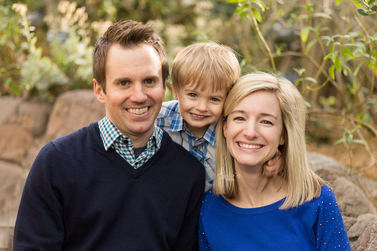 Couple with young boy smiling at camera - St. Louis Photography