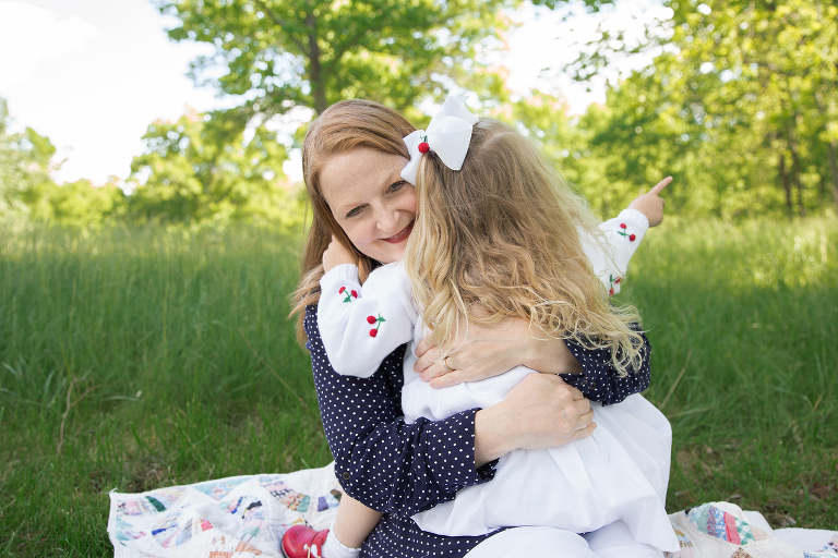 mother hugging her little girl | St. Louis Photographer