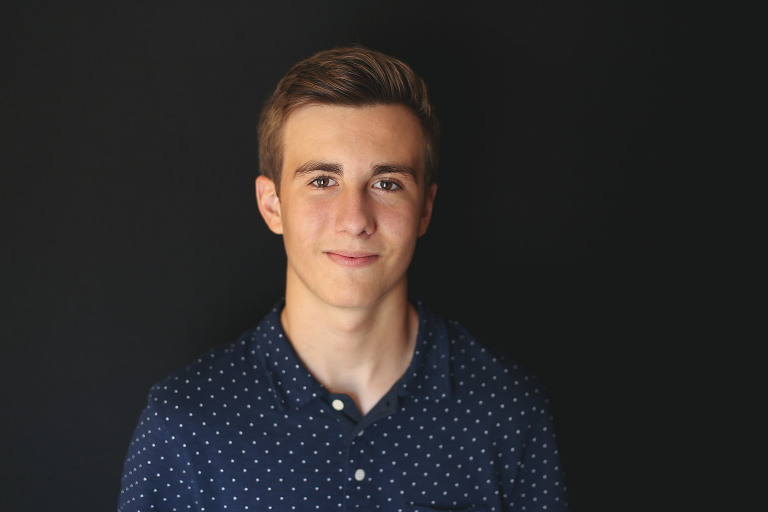 Teenage boy smiling and looking at camera | St. Louis School Photography