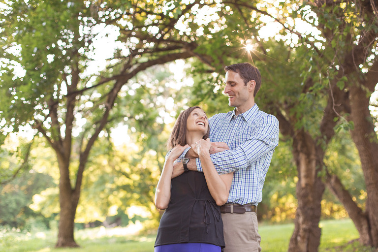 Husband and wife looking at each other in Faust Park | St. Louis Family Photographer