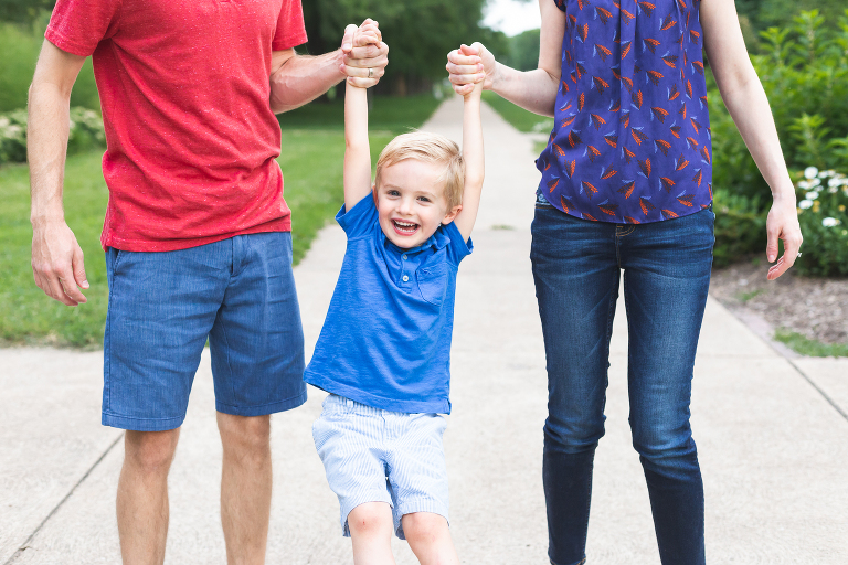 Family of 3 playing together in Francis Park | St. Louis Photography