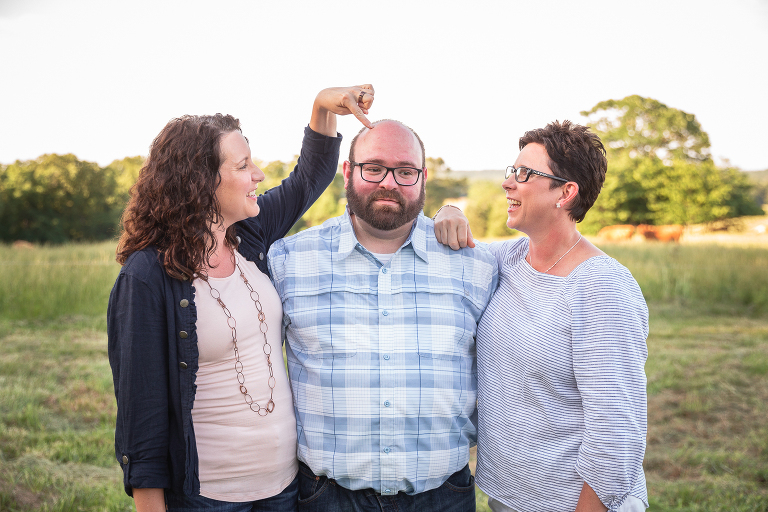 Adult siblings teasing each other | St. Louis Family Photographer