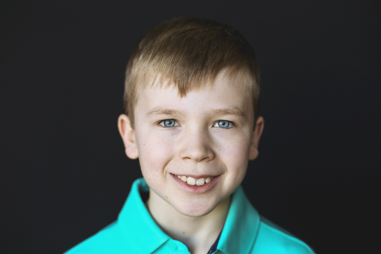 Young boy looking at camera | St. Louis School Photographer