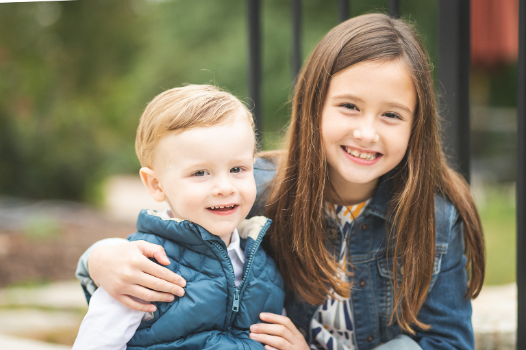Big sister with her arm around little brother at Oak Knoll Park | St. Louis Photos