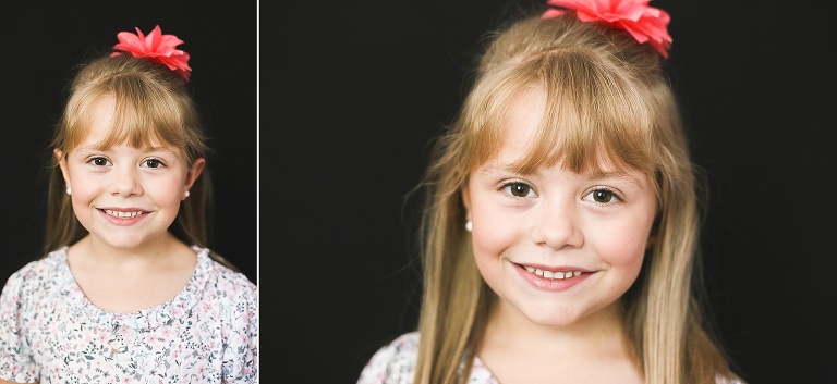 School photo of young girl with flower bow in her hair | KGriggs Photography
