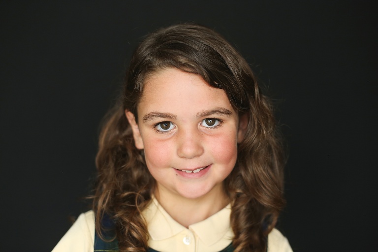 School photo of young girl with big brown eyes and brown hair | St. Louis School Photographers
