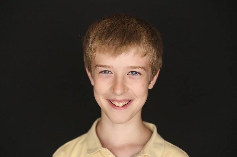 School photo of boy with blue eyes and blonde hair | St. Louis School Photogs