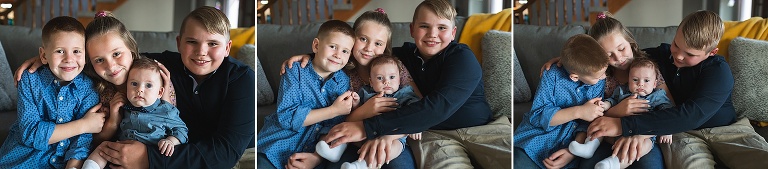 Siblings holding new baby brother | KGriggs Photography