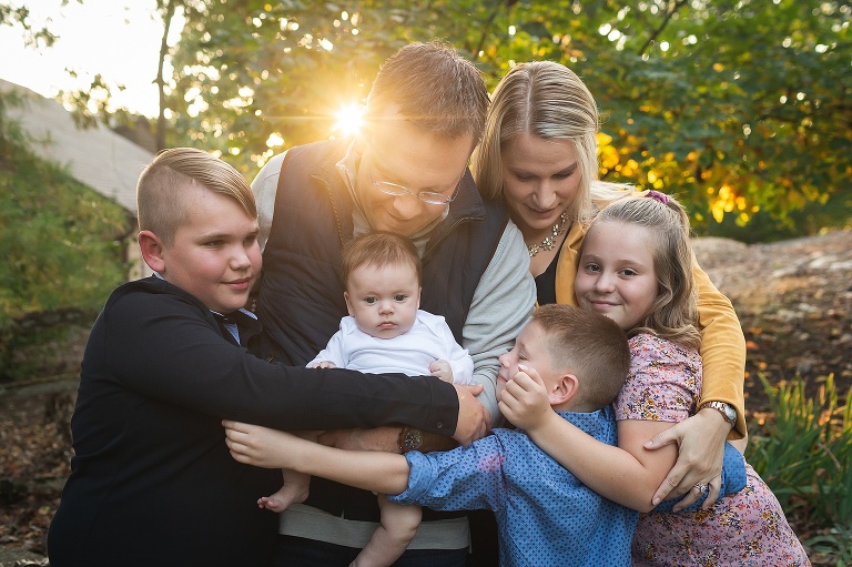 Family with sun flare shining | KGriggs Photography