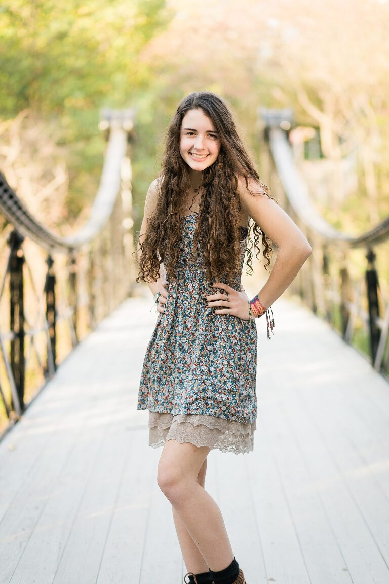 Young woman on bridge in Forest Park | KGriggs Photography